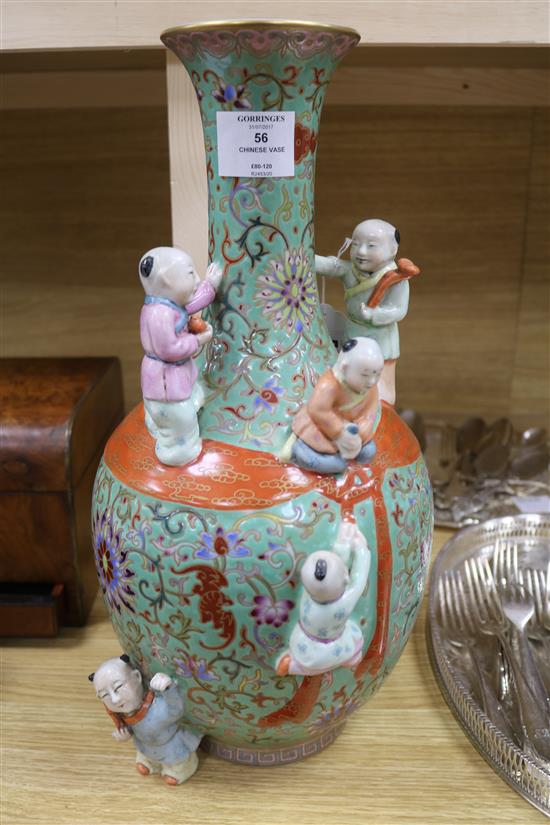 A Chinese green ground Boys vase